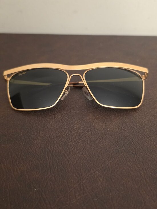 The Vintage Ray-Ban Sunglasses feature a classic gold metal frame with Olympian main image 8